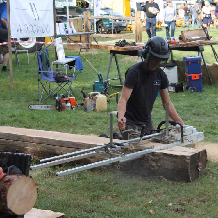 James demonstrating his Alaskan saw mill (Summerhill Woodwork)