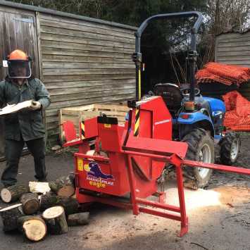 Man using a Firewood Processor