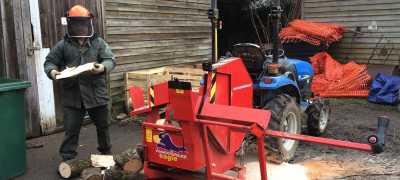 Man using a Firewood Processor